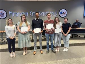 four scholarship recipients